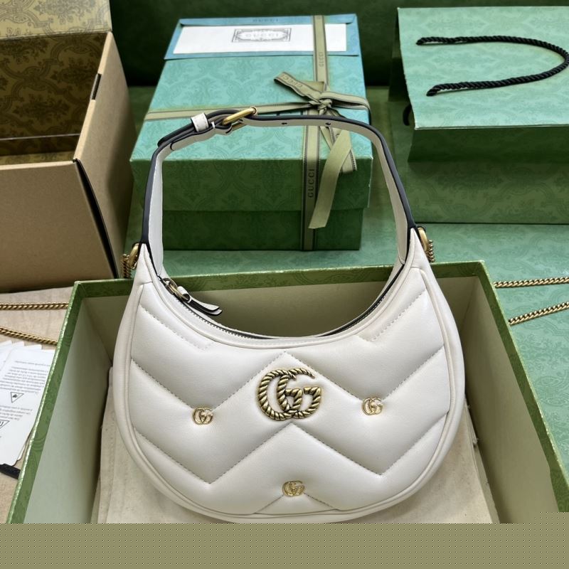 G*u*i top handle bags
